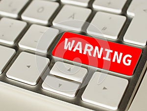 Warning on Red button of a keyboard