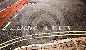 Warning road marking for Pedestrian Look left