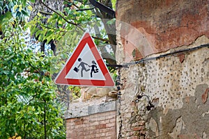 Warning road sign of Children on the street in Siena. Italy