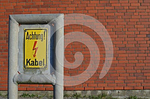 Warning sign: Achtung Kabel / Caution cable
