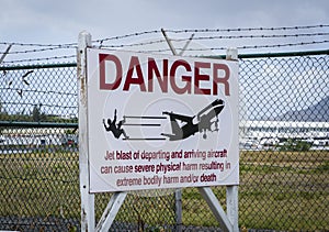 Warning sign at airport on Saint Martin island near Moho beach photo