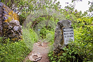 Warning sign on the Cliff walk trail in York Maine