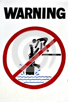 Warning sign - danger crocodiles, no swimming