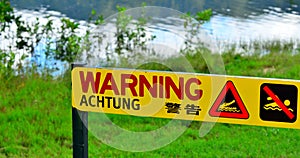 Warning sign - danger crocodiles, no swimming in Queensland, Australia