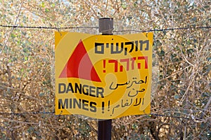 Warning sign with Danger Mines