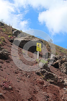 Warning sign from falling rocks at Mount Vesuvius Italy