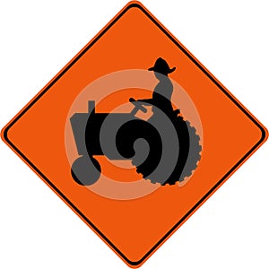 Warning sign with farm tractor