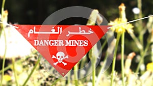 Warning sign in front of a minefield