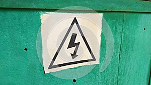 warning sign for high voltage on a transformer door