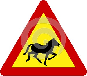 Warning sign with horses on road