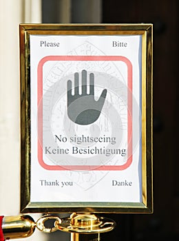 Warning sign during a mass in a church