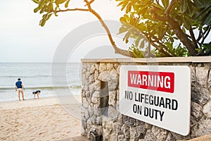 Warning sign of no life guard on duty