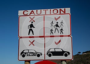 Warning sign at a parking lot near the Kaaimans River Pass photo