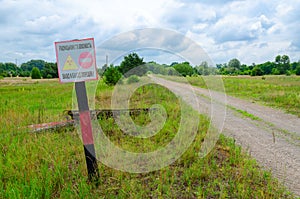 Warning sign Radiation hazard. Entry and entry is prohibited! in Chernobyl exclusion zone