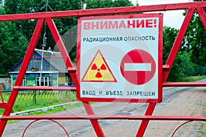 Warning sign Radioactivity and prohibitory sign Entry prohibited at entrance to 30-kilometer Chernobyl exclusion zone