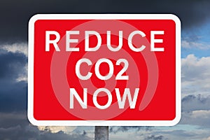 Warning sign REDUCE CO2 NOW