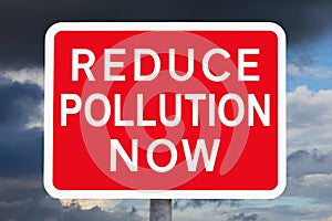 Warning sign REDUCE POLLUTION NOW