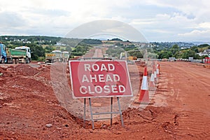 Warning sign on a road construction site