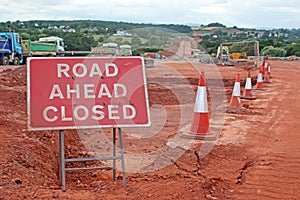 Warning sign on a road construction site