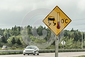 Warning sign for slippery icy road trans canada photo