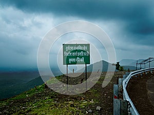 Warning Sign on Sloped Mountain Roads of India