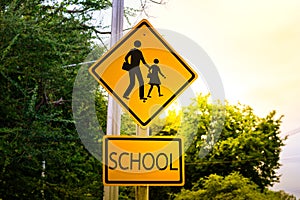 Warning sign for students school crossing the street