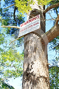 WARNING SIGN swim and boat at your own risk, no lifeguards,  BROOKS POND spencer ma