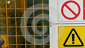 Warning sign text with black painted letters on yellow background. Concept for do not enter the area, caution, danger