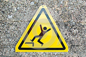 Warning sign .Watch your steps not to fall