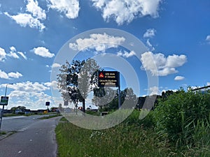 Warning signs along side of A20 freeway in Moordrecht for works