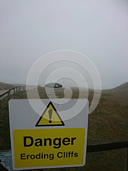 Warning signs. Be careful when walking, dander clifs, eroding cliffs. Cornwall Perranporth Holiday