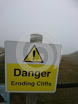 Warning signs. Be careful when walking, dander clifs, eroding cliffs. Cornwall Perranporth Holiday