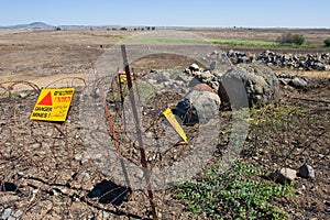 Warning signs with Danger Mines