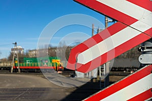 Warning signs at railway crossing with the train