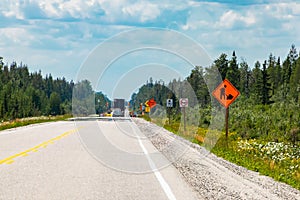 Warning signs before road work zones photo