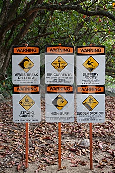 Warning Signs on Surfing Site Beach Hawaii