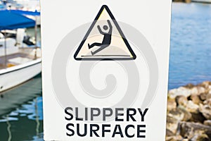 Warning: Slippery Surface sign