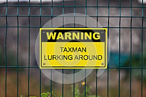 Warning Taxman lurking around photo
