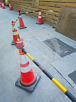 Warning triangle cones placed for road construction work.