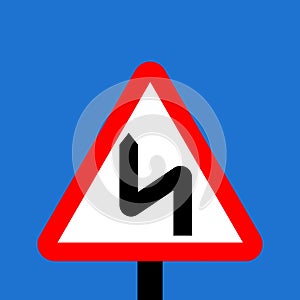 Warning triangle double bend first to left