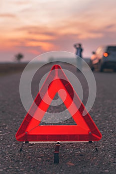 Warning triangle sign on the road photo