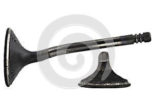 Warped and cracked engine valve spindle made of heat-resistant steel, covered with soot, isolated on a white background.