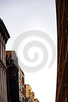 Warped and curled fish eye image of a city street with buildings