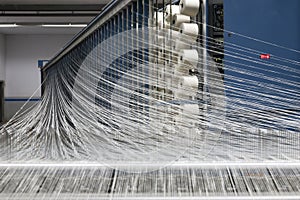 Warping machine in a textile weaving factory