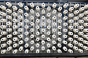 Warping machine in a textile weaving factory