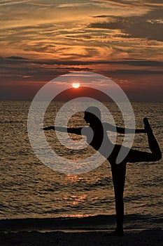 Warrior pose from yoga by woman silhouette