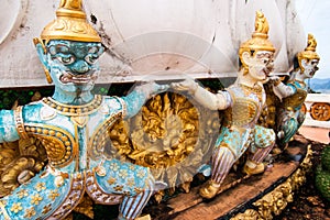 Warrior statues guarding stupa