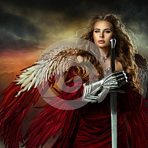 Warrior Woman with Sword. Medieval Female Knight in Armor. Beautiful Viking Girl as Battle Goddess with Wings in Red Fantasy Dress