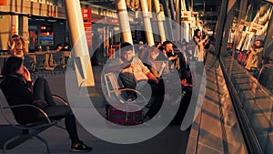 WARSAW, POLAND - APRIL, 14, 2017. Passengers awaiting for the boarding at international airport terminal in the evening