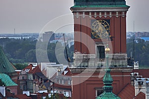 Warsaw, Poland - August 11, 2017: Beautiful aerial night panoramic view of clock tower, Plac Zamkowy square in Warsaw, with